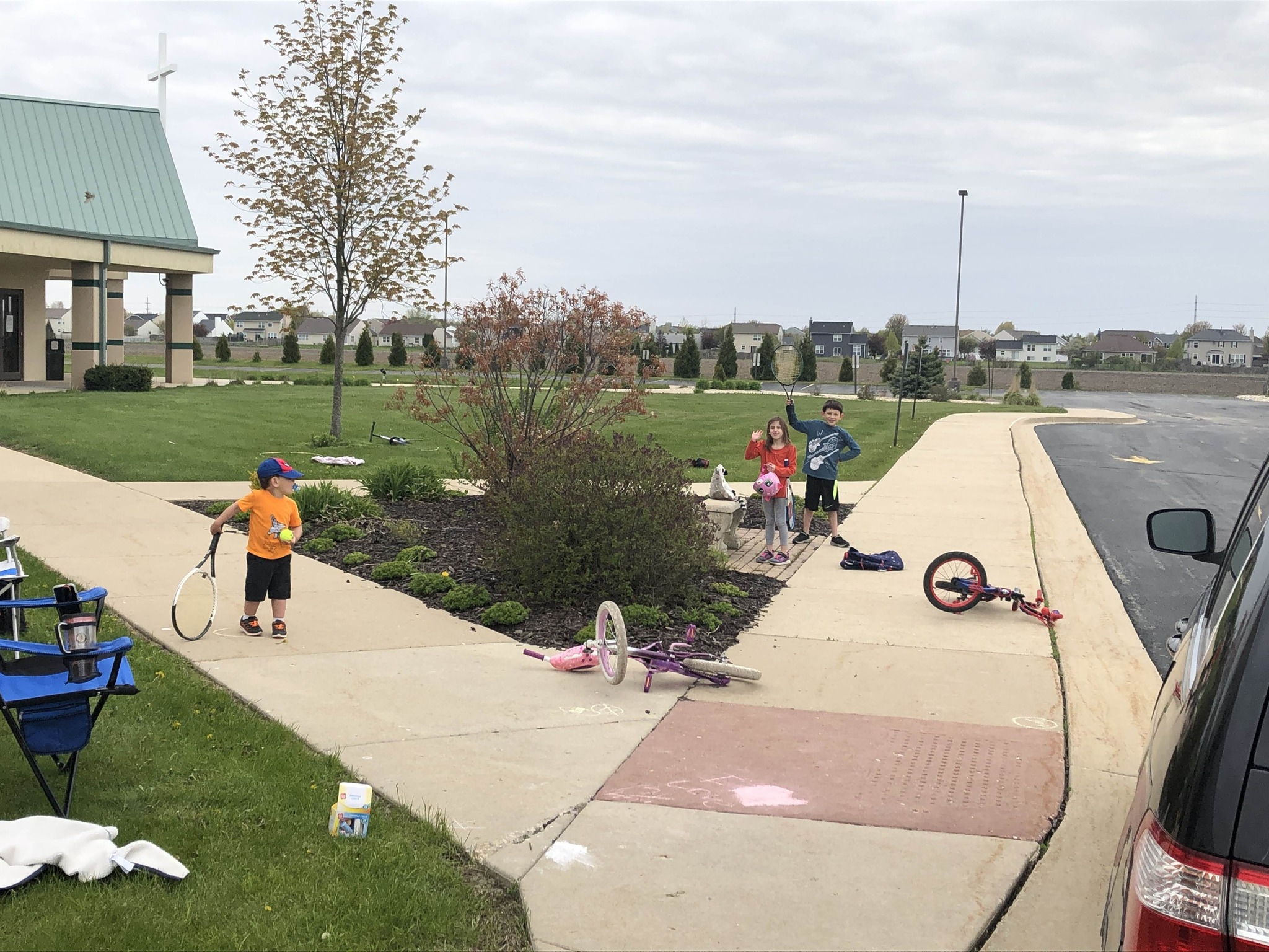 Church kids playing on bikes